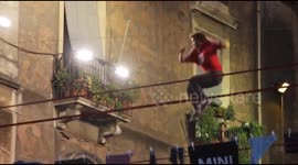 Peformers show off slacklining skills over Italy streets