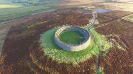 Drone films Equinox sunrise through ancient temple door