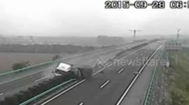 Truck turns over on highway