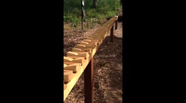 Impressive long xylophone plays Bach song without a player