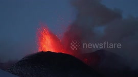 Eruption of the volcano Etna in Sicily at sunset