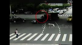 Scooter rider miraculously escapes truck crash
