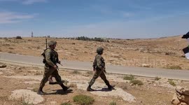 Palestinian activists scuffle with Israeli soldiers during a protest after Israeli top court paved way for razing eight Palestinian hamlets, in Masafer Yatta, south of Hebron, in the West Bank
