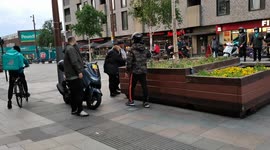 A white couple bully Asian immigrant male delivery boys at high Street, London, UK