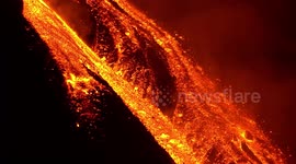 Mount Etna's eruption spectacle: rivers and jets of lava
