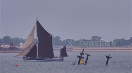 Thames Barge Race sails past historic shipwreck's masts for last time off Kent, UK