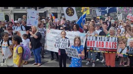 'We are not your lab rats': children stand in front of Worldwide Freedom Rally's procession
