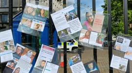 Anti-vax hang photos of young people who they believe have died following COVID-19 vaccination