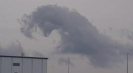Vortex spins up in roll cloud near Claremont, Minnesota