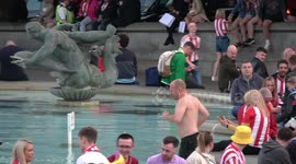 Sunderland fans celebrate promotion to the Championship League in Trafalgar Square, London