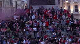 Sunderland fans party late into the night, letting off flares, climbing fountains and singing as they celebrate promotion at Trafalgar Square