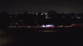 Minivan drives into highway sign pole at full speed and a second car drives off highway avoiding him