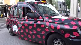 London black cab with Lulu Guinness red lips advertising spotted in Chelsea
