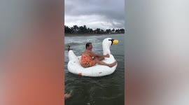 Grandma, 60, falls into water in amusing fail after riding inflatable duck for first time
