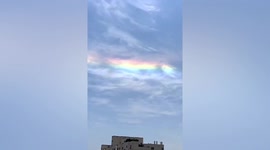 Bizarre multicoloured clouds spotted shimmering above Chinese city