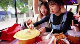 Next stop, hot pot! Bus where passengers are served meals debuts in Chinese city