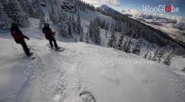 'Friends crash into each other while enjoying fresh powder *Snowboarding Fail*'