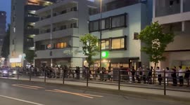 Japan: Tokyoites Gather On Streets To See Joe Biden’s Convoy Near Dinner Party Venue