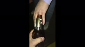 Guy's finger stuck in a beer bottle!