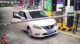 Car damages barrier after motorist chases wife during argument in China