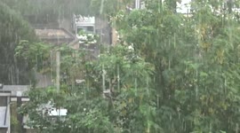 Pouring rain and hail storm hit London at the end of May