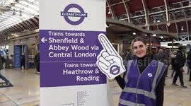 Elizabeth line has opened on London tube - traffic warden provides information at Paddington
