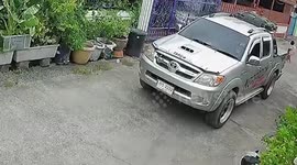 Truck reverses over toddler who miraculously emerges unscathed