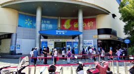 WalMart Supermarket Reopens In Shanghai, China