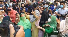 Noisy protest outside Kashmir separatist leaders home as he is given a life sentence in India