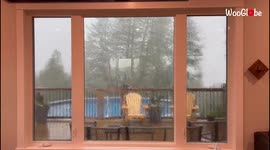'Gripping footage shows chairs flying off the deck during brutal windstorm in Ontario '