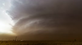 An incredible massive supercell spins over West Texas farmland