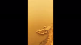 Thick yellow haze while crossing a bridge in Baghdad during its latest sandstorm