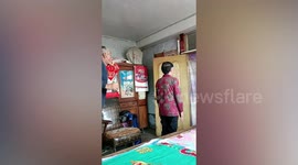Elderly man spits Chinese liquor over sister to 'disinfect her'