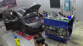 Car wheel flies off while being repaired in garage