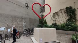 Mechanical iron heart installed in Paris. Ephemeral art of work by Noutayel and Le Socle near the Centre Pompidou. Paris, France. 27 may 2022