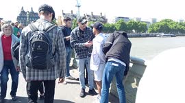 Suspected 'cup and ball' scammer gang arrested on London's Westminster Bridge