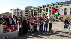 Foreign activists and Palestinians take part in a protest following the death of veteran Al Jazeera journalist Shireen Abu Aqleh, shot dead by Israeli troops as she covered a raid on the West Bank's Jenin refugee campin Berlin