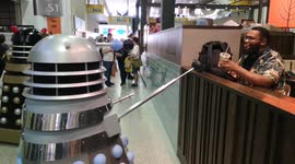 Decaffeinate! Decaffeinate! Hilarious Dr Who Dalek points death ray at cafe customer in London's MCM Comic Con