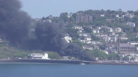 Luxury £6million yacht burns in Torquay, Devon, filling the air with clouds of toxic smoke