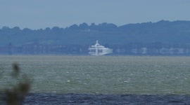Superyacht Gitana seen 'levitating' due to atmospheric effects off Kent, UK coast