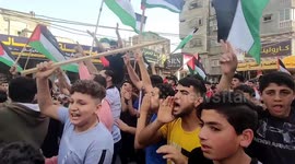 Palestinians protest in northern Gaza Strip as Israeli nationalists chant racist slogans in Jerusalem march