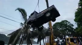 Three killed as pickup truck plunges into the sea in Padang, Indonesia after avoiding collision