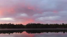 Awesome clouds pink skies water reflction Pike Lake Chain Iron River WI