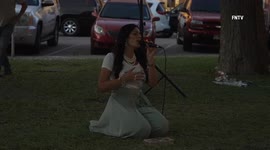 200 mourners gather to sing and pray at night-time vigil in Uvalde, Texas