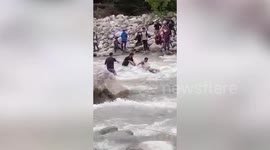 Fire fighter crew rescues man from raging Himalayan river in northern India