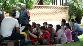 Relatives gather at Pokhara Airport as rescuers retrieve bodies from plane crash site