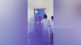 Groom leaves room covered in powder after groomsman lets of smoke bomb in China