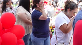 Mourners at the Uvalde memorial in Uvalde Texas