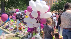 Mourners gather to pay respects at memorial in Uvalde to those killed in school shooting