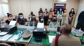 Angry Thai women converge on police station to report botched boob jobs